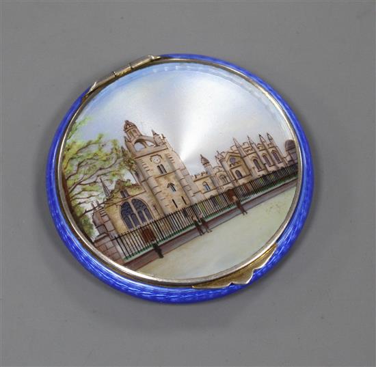 An early to mid 20th century silver gilt and guilloche enamel circular compact